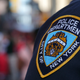 New York City - Circa 2016: NYPD sleeve patch shield on a police officer patrol in Manhattan. Protect public from terror threats and ensure safety in popular city and target for attacks.